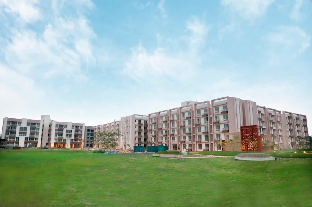 Front elevation of Swayam City residential project in Joka with open spaces and modern design