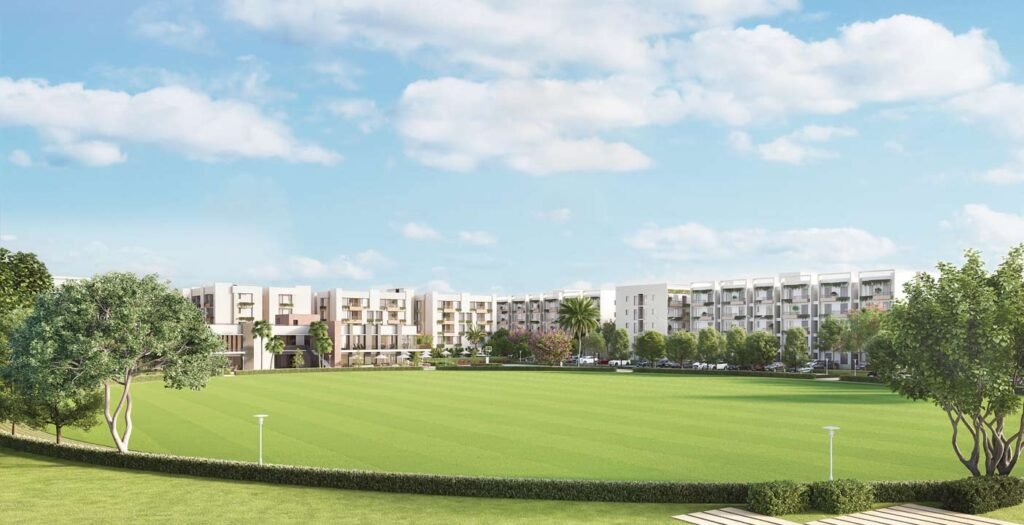 Residents enjoying cricket field and landscaped gardens at Swayam City Joka